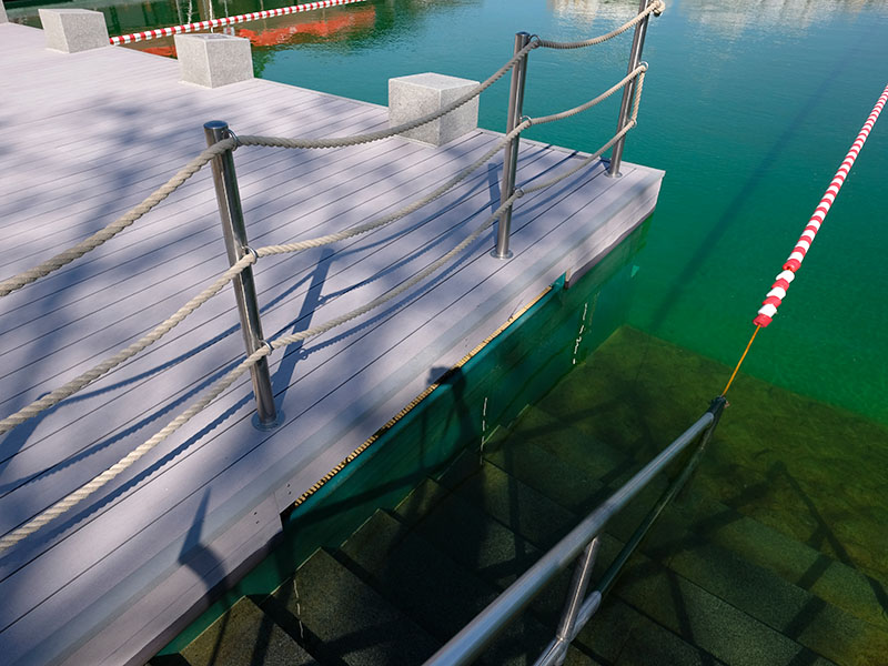 Graue WPC Dielen an Bootssteg mit grauen Dielen und maritimen Geländer aus Seil
