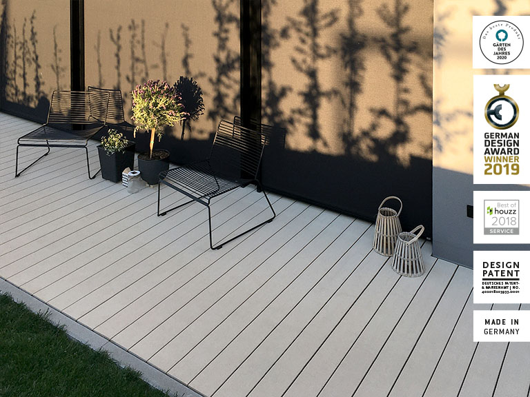 WPC Bodenbelag frostsicher und barfußfreundlich auf Terrasse im Herbst
